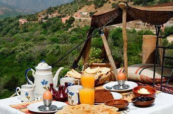 Breakfast with a beautiful view of the Atlas Mountains in Morocco. __ #shesaidyes #engaged…