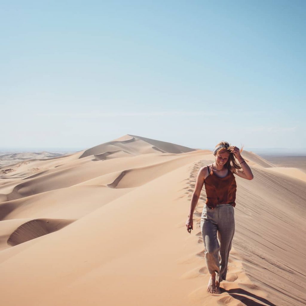 Evening walk in Gobi Desert. The Khongor sanddunes are 180 km long and at…