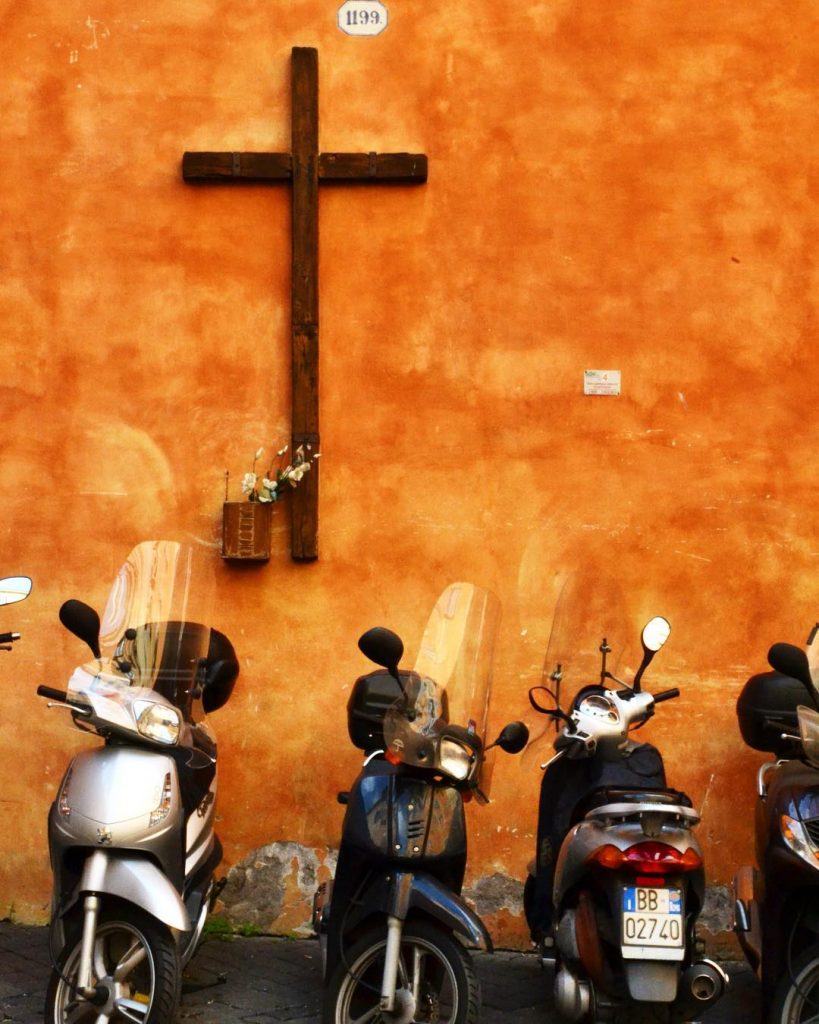 Crosses and mopeds, what could be more indicative of another photo from Rome? Happy&hellip;