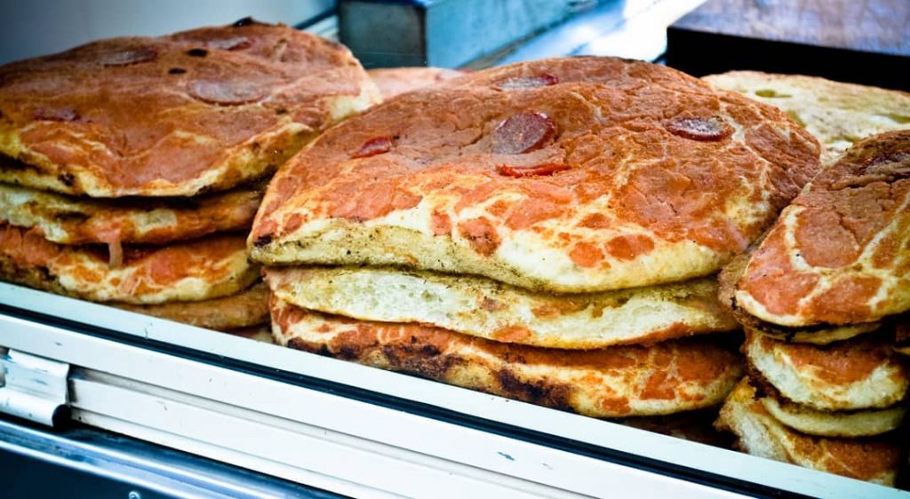 “Sfincionello” looks like pizza, but it isn’t. Looks like bread, but it isn’t. “Sfincionello”&hellip;