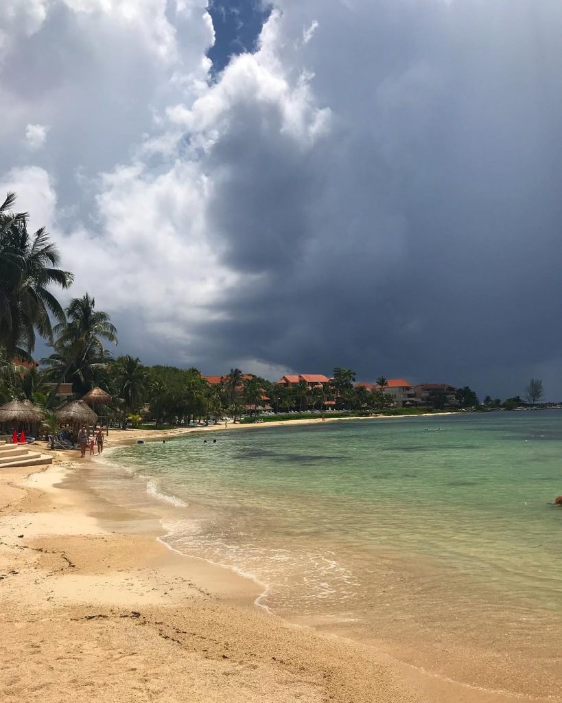 After a morning of swimming in a bathtub-warm sea, the dark clouds rolled in.…