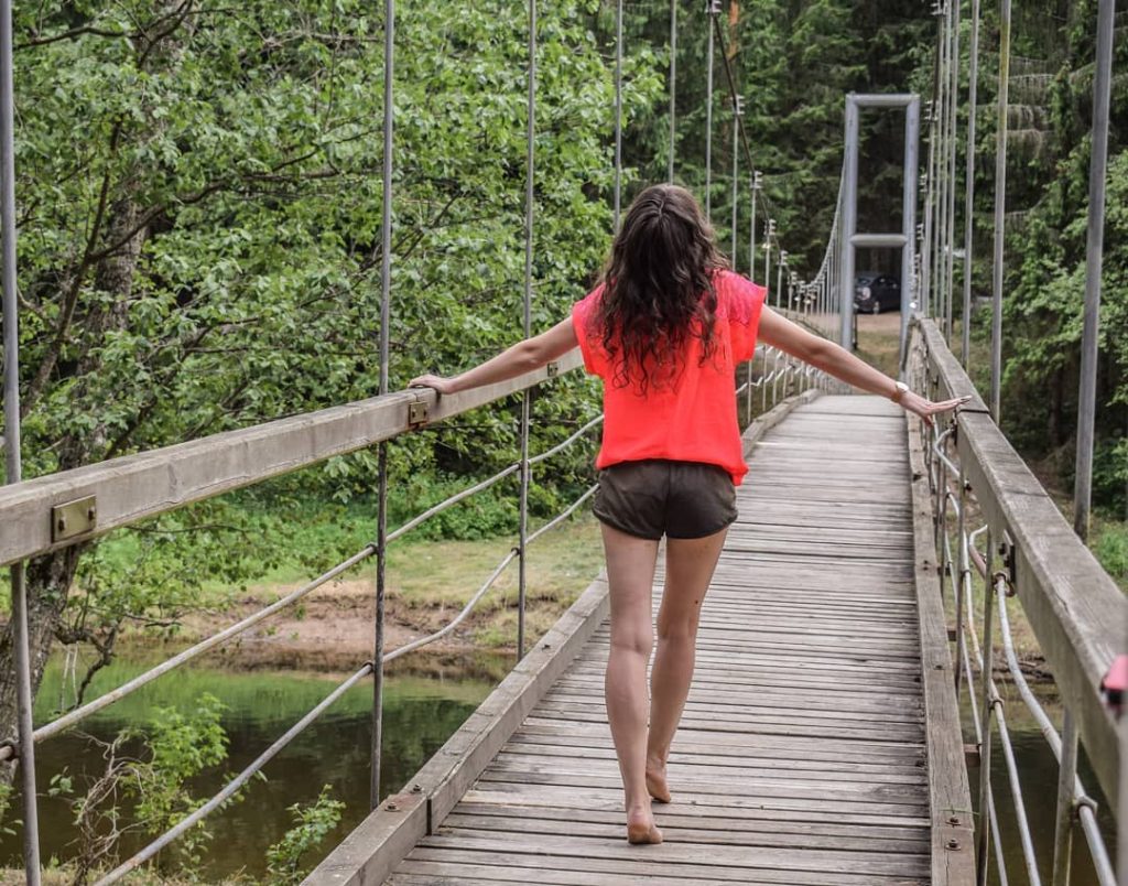 From one side to . . . . #girl #bridge #river #lithuaniangirl #lithuania #red&hellip;