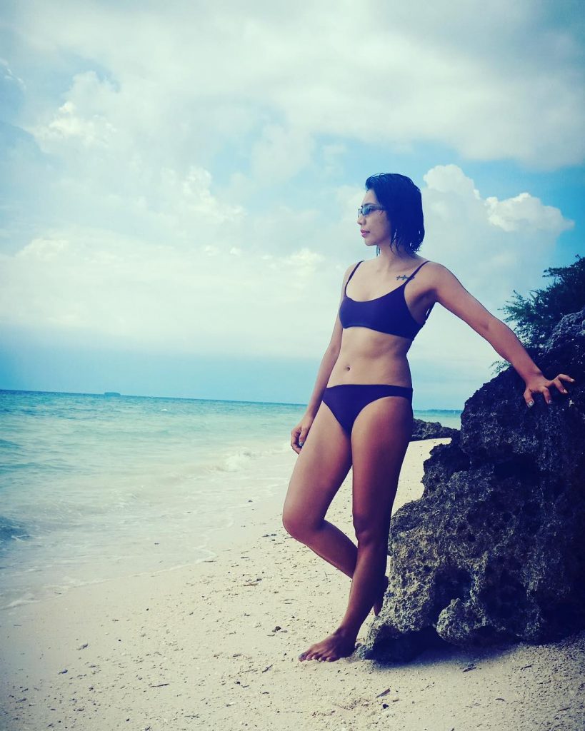 The sun above my head, the sand beneath my feet. Always the happy place…