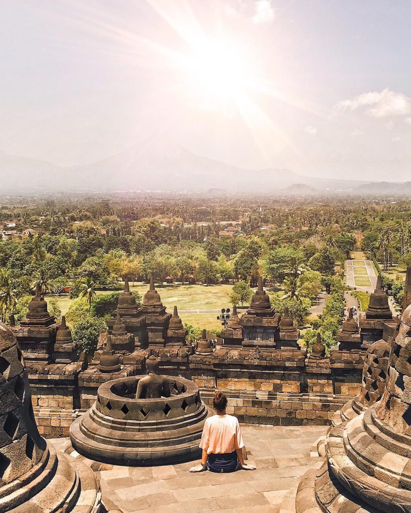 Admiring the beauty of the biggest buddhist temple in the world in Borobudur Temple,&hellip;