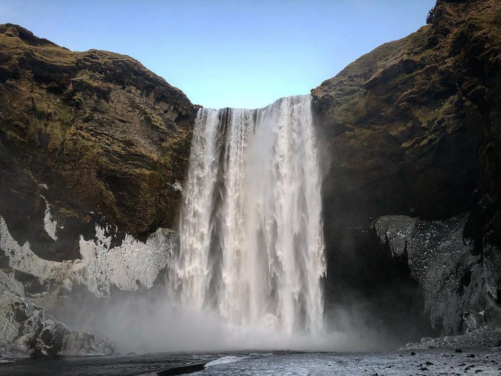Skógafoss is great because the beauty draws you in and the layer of ice…