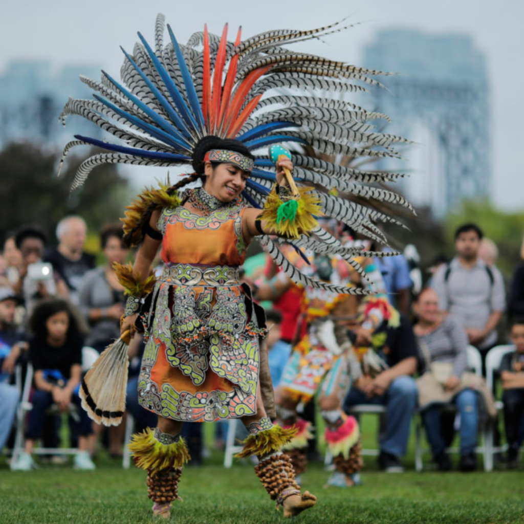 A vibrant scene from an Indigenous festival showcasing traditional celebrations and cultural expressions in a remote setting.