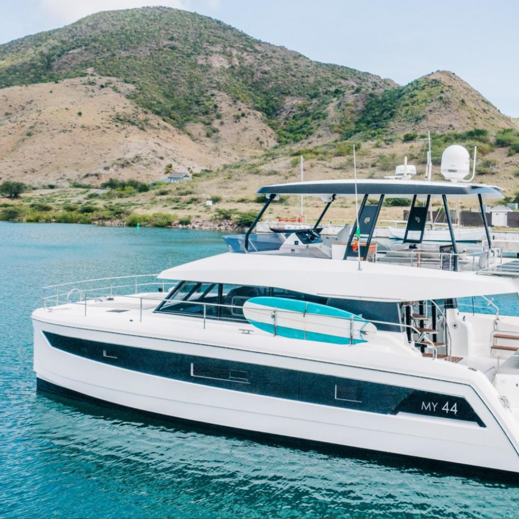 A luxurious cruise ship sailing through serene waters, showcasing elegance and adventure beyond traditional cruising experiences.