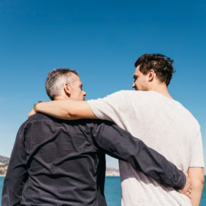 A vibrant graphic promoting Father's Day 2024 with travel adventure themes and celebratory elements.