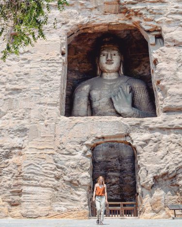 This is in front of one of the 50 magnificent Yungang caves. The Chinese…