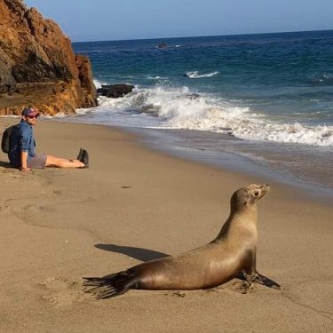We both are mammals, we both love the water, and both are made of…