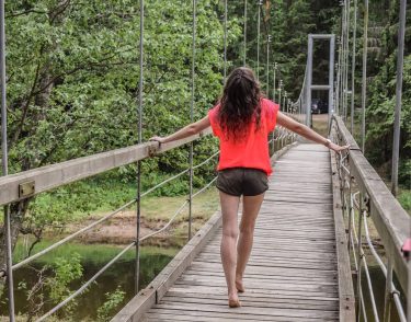 From one side to . . . . #girl #bridge #river #lithuaniangirl #lithuania #red…