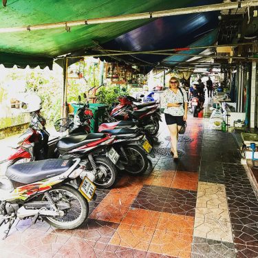 Strolling the hidden and colourful street of Bangkok with this crazy one