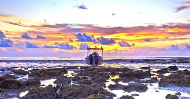 Sooryodaya chandrodaya devara krupe kaano! An boat anchored at the early morning beautiful golden…