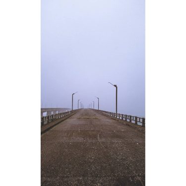 There’s something cold and blank Behind her smile She’s standing on an overpass In&hellip;