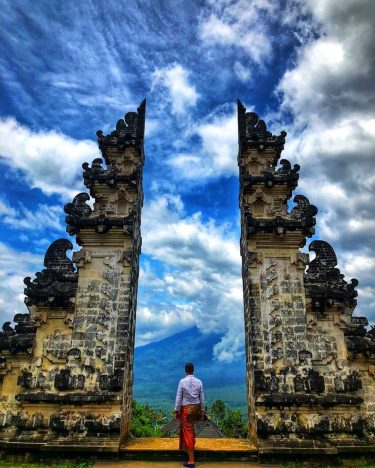 Above ‍️with an amazing view of Mt Batur volcano *Lempuyang Temple, locally referred to…