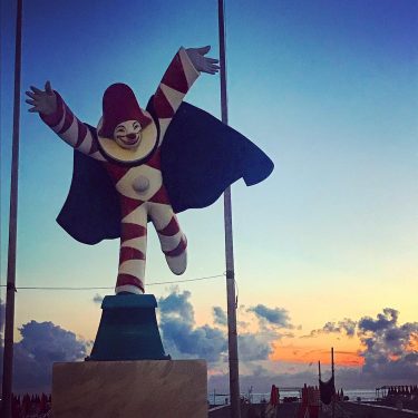 sunset over viareggio’s burlamacco ???? . . . . #beach #beachlife #italy #bellaitalia #chill…