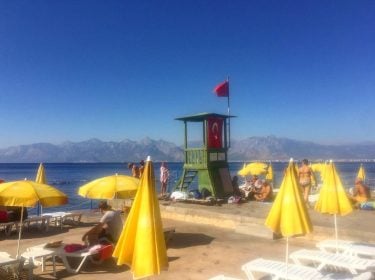 Antalya is bounded by turquoise water and beaches on one side and fringed by…