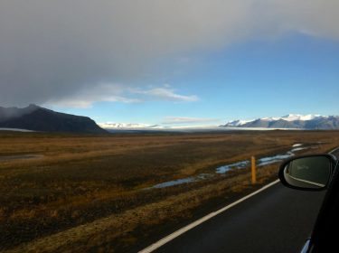 A glimpse of Yes, I saw it true. Burnt grass covered with grey clouds…