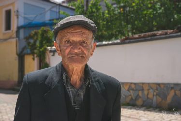 This man was wandering down the Albanian streets. After I’ve asked him for…