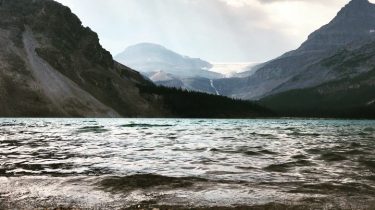 In awe of the majestic mountains and glaciers at Bow Lake. Read about travels…