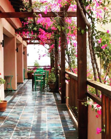 Pretty places to eat in Crete! Read about our travels to Greece at !…