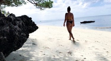 She would be half a planet away, floating in a turquoise sea, dancing by…