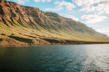 Beautiful island of Lanzarote. I took the photo from a ferry. And I used…