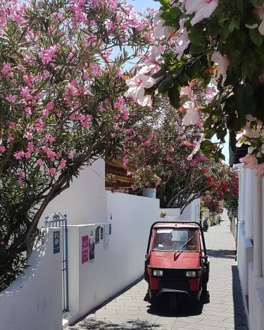 Narrow streets in Villagio Stromboli – a small italian village on activ Stromboli Volcano;…