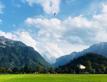 Interlaken is a charming resort town in Switzerland. It gets its name from being…
