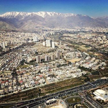 Tehran from the sky with snow mountains in the background #tehran #iran #city #bnesimppl&hellip;