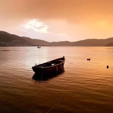 Rainy sunset in Fethiye bay #turkey #fethiye #sea #boat #mugla #red# mediterranean #bnesimppl #nature…