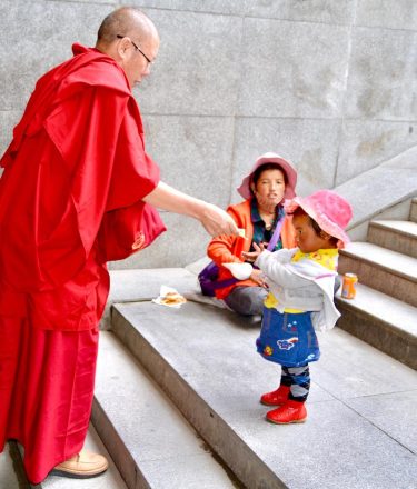 Charity to a child by a Tibetan Monk living up to the tenets of…