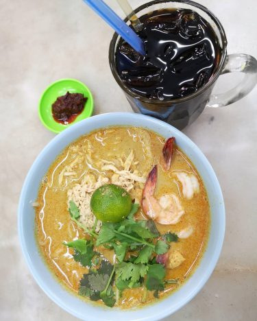 Famous Asam Laksa rice noodles and Kopi O Bing . . . #travels #traveldiary…