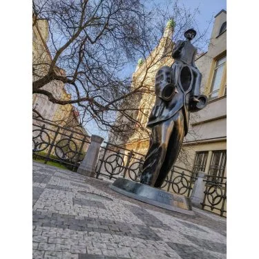 A statue on the border of the Jewish Quarter depicting the author Franz Kafka,…