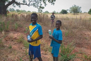 Next up, three kids that were playing near one of our pit-stops. The…