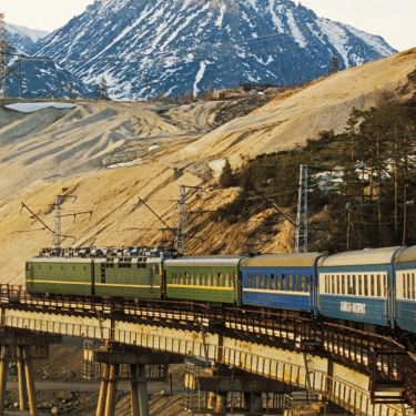 Scenic view of the Trans-Siberian Railway, showcasing the vast landscapes of Eurasia during an adventurous journey.
