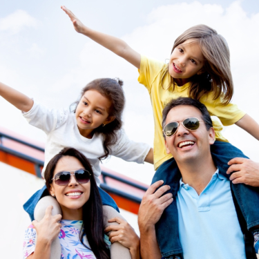 A joyful family enjoying an outdoor adventure, capturing precious moments together with their children.