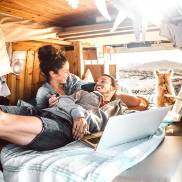 A cozy van parked in a scenic landscape, symbolizing the freedom of vanlife adventures and exploration.