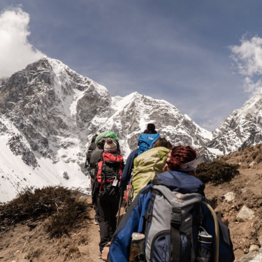 A rugged landscape showcasing adventurers navigating extreme terrains and harsh conditions during their expeditions.